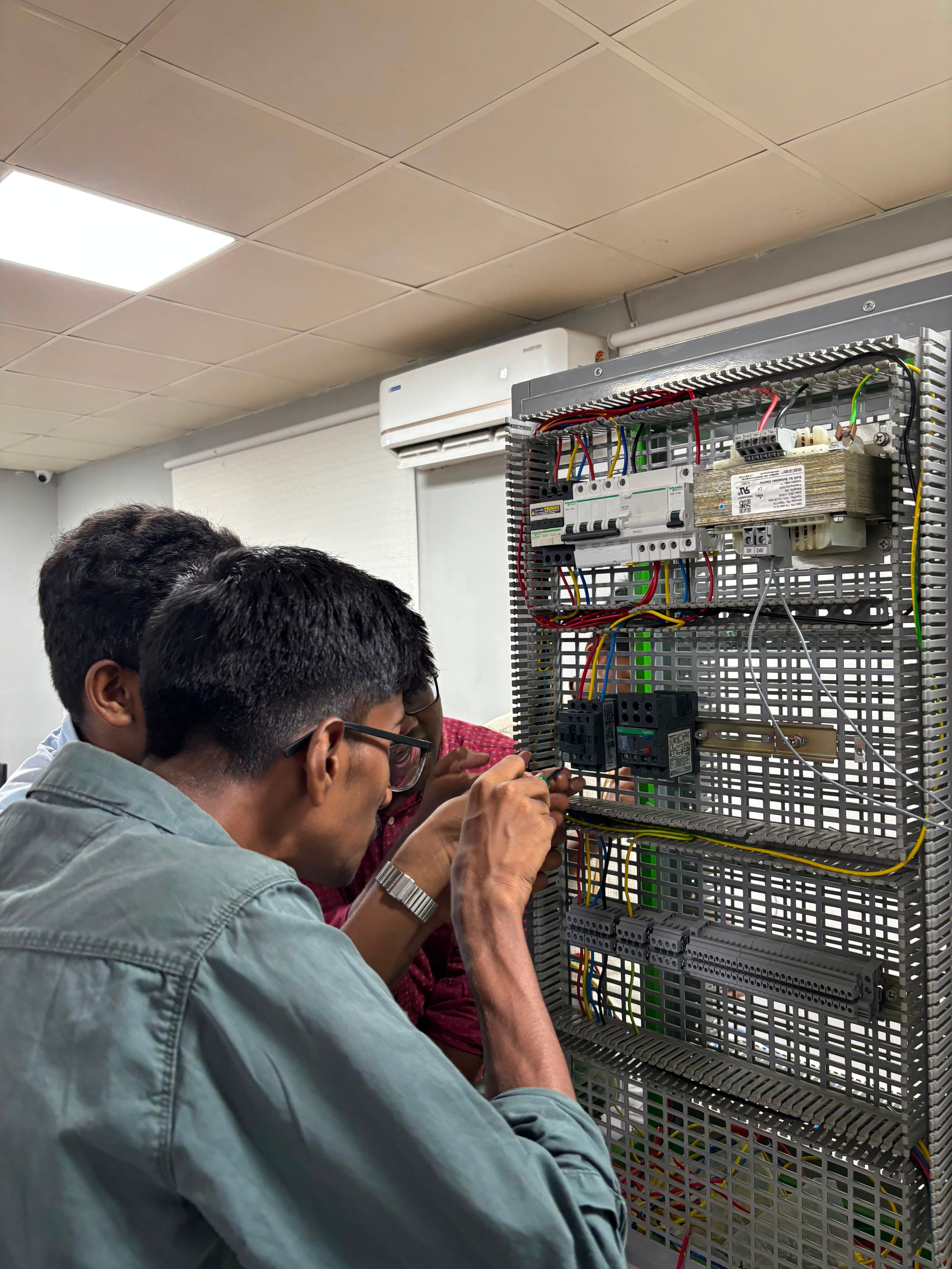 Srihari Manikandan working in the mechatronics and robotics laboratory